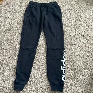 Black Adidas sweatpants